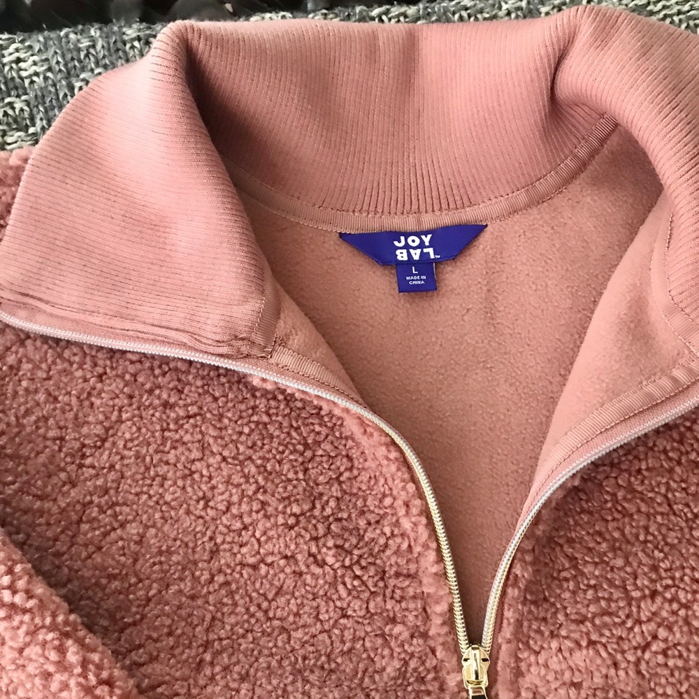 L pink fuzzy throw over